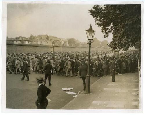 The Ashes. England v Australia 1926. Four original mono press photographs depicting a variety of scenes from the 1926 Ashes series. Images feature large crowds queuing outside Lord’s for the 2nd Test, 26th- 29th June 1926, Ryder clean bowled by Tate in th