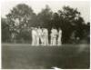 Claude Bowes-Lyon, 14th Earl of Strathmore and Kinghorne. Two original mono press photographs, one of Lord Strathmore batting, the other with team members in conversation on the pitch. Pencil annotations to verso describe ‘Lord Strathmore’s XI v Drapers o - 3