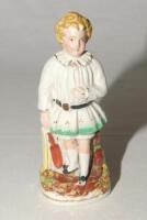 Staffordshire figure. Original Staffordshire 19th century pottery figure of a child holding a cricket bat to side, wearing a white smock coat and bloomers with stumps behind. Approximately 6” tall. Some minor wear otherwise in good condition