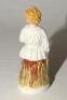 Staffordshire figure. Original Staffordshire 19th century pottery figure of a child holding a cricket bat to side, wearing a white smock coat and bloomers with stumps behind. Approximately 6” tall. Some minor wear otherwise in good condition - 2