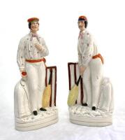 Julius Caesar and George Parr. A pair of original large Staffordshire cricketing figures, believed to be of Caesar and Parr. Both figures beautifully decorated, the figure of Caesar standing beside a set of brown cricket stumps holding a cricket bat, wear