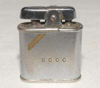 Ronson ‘Whirlwind’ cigarette lighter engraved to one side ‘S.C.C.C.’ for Surrey County Cricket Club with band of colour to corner and to the verso ‘J.W. McMahon’. The lighter was presented to McMahon during his time playing for the club, odd surface marks