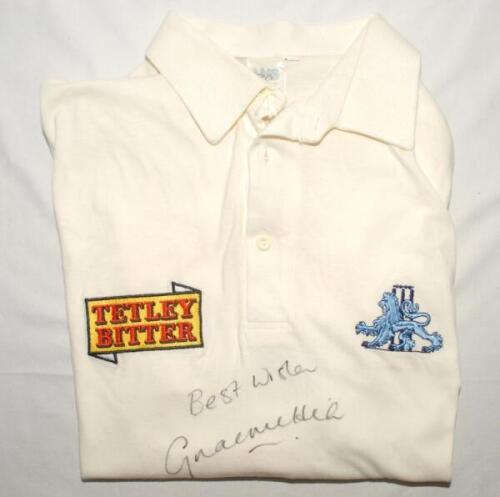 Graeme Hick. Worcestershire & England. England white short sleeve Test shirt worn by Hick during his England career. Shirt with England emblem and ‘Tetley Bitter’ to chest. Signed to the chest by Hick. Previously sold at Graeme Hick’s Benefit auction held