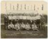 Olympics 1920. Men’s hockey. Original mono photograph of the English (field) hockey team who won the gold medal at the Antwerp Olympics in 1920. Players are depicted standing and seated in rows in front of a goal, and the photograph is very nicely and ful