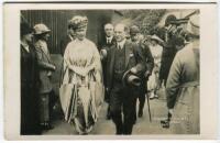 ‘Wimbledon 1914’. Rare original mono real photograph postcard of dignitaries King George V, Queen Mary and the Prime Minister Herbert Asquith visiting Wimbledon. Card no. 021 in a series issued by Edwin Trim & Co. of Wimbledon, with publishers name print