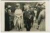 ‘Wimbledon 1914’. Rare original mono real photograph postcard of dignitaries King George V, Queen Mary and the Prime Minister Herbert Asquith visiting Wimbledon. Card no. 021 in a series issued by Edwin Trim & Co. of Wimbledon, with publishers name print