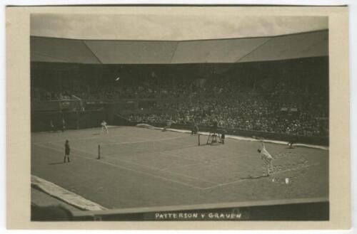 ‘Wimbledon. Patterson v Graven 1922’. Original mono real action photograph postcard showing Gerald Patterson playing Axel Graven in a 2nd round men’s singles match on Centre Court. Card no. A131 in a series issued by Edwin Trim & Co. of Wimbledon, publish