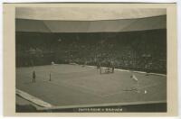 ‘Wimbledon. Patterson v Graven 1922’. Original mono real action photograph postcard showing Gerald Patterson playing Axel Graven in a 2nd round men’s singles match on Centre Court. Card no. A131 in a series issued by Edwin Trim & Co. of Wimbledon, publish