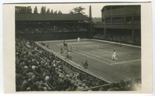 ‘Wimbledon Number One Court’ circa 1937. Original mono action real photograph postcard with a men’s singles match in progress. Un-numbered postcard issued by Edwin Trim & Co. of Wimbledon, publishers blind stamp to lower corner. Postally unused. Very good