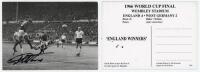 World Cup 1966. ‘1966 World Cup Final Wembley Stadium England Winners’. Limited edition mono postcard of Geoff Hurst scoring the first of his three goals in the Final against West Germany. Signed to the postcard by Hurst and Roger Hunt. Sold with an offic