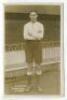 Solomon Upton. Tottenham Hotspur 1912. Sepia real photograph postcard of Upton, full length in Spurs attire in front of the main stand. Title to lower border ‘S. Upton. Tottenham Hotspur’. Jones Bros of Tottenham. Minor light fading to image otherwise in