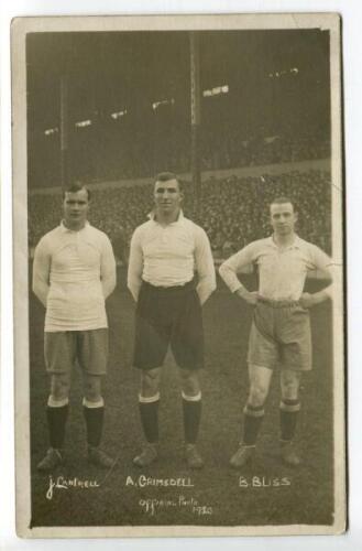 Arthur Grimsdell. Tottenham Hotspur 1912-1929, James Cantrell. Tottenham Hotspur 1912-1922 and Herbert Bliss. Tottenham Hotspur 1912-1922. Mono real photograph postcard of the three players, full length, in Spurs attire on the pitch in front of a packed W