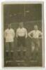 Arthur Grimsdell. Tottenham Hotspur 1912-1929, James Cantrell. Tottenham Hotspur 1912-1922 and Herbert Bliss. Tottenham Hotspur 1912-1922. Mono real photograph postcard of the three players, full length, in Spurs attire on the pitch in front of a packed W