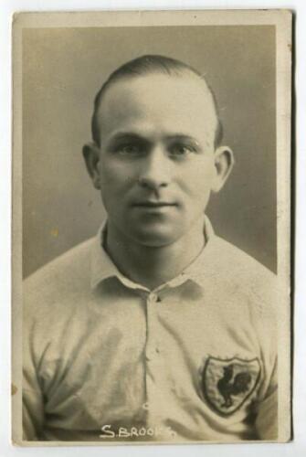 Samuel Ernest Brooks. Tottenham Hotspur 1922-1924. Mono real photograph postcard of Brooks, head and shoulders, in Spurs shirt. Title ‘S. Brooks’ printed to lower border. W.J. Crawford of Edmonton postcard. Good/very good condition Postally unused