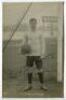 Ernest Clarke Williamson. Tottenham Hotspur 1916-17. Mono real photograph postcard of goalkeeper Williamson, full length, in jersey with football in left hand standing next to the goal. Title ‘E.C. Williamson’ to lower border. Nicely signed in ink by Will