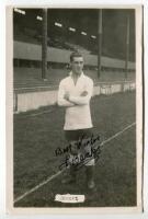 James Andrew Banks. Tottenham Hotspur 1913-1923. Mono real photograph postcard of Thompson, full length, wearing Spurs attire in front of the main stand. Very nicely signed in ink by Thompson. Name printed to lower border. W.J. Crawford of Edmonton postca