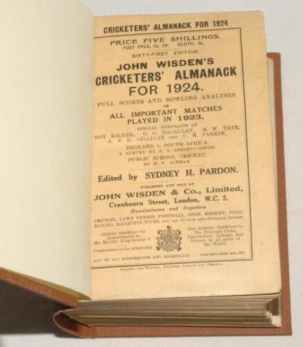 Wisden Cricketers’ Almanack 1924. 61st edition. Original paper wrappers, bound in brown boards, with gilt titles to spine. Some wear and minor loss to top corner of rear wrapper, minor soiling to wrappers, some minor rust marks to page block causing sligh