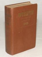 Wisden Cricketers’ Almanack 1940. 77th edition. Original hardback. Limited number of copies printed in this war year. Dulled gilt titles on spine paper, minor wear and slight soiling to boards, some small loss to edges of two ‘index’ pages, minor nick to 