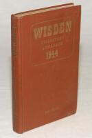 Wisden Cricketers’ Almanack 1944. 81st edition. Original hardback. Only 1500 hardback copies were printed in this war year. Dulled gilt titles on spine paper, minor marks to rear board, otherwise in very good condition with gilt titles to front board brig