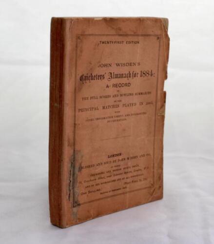 Wisden Cricketers’ Almanack 1884. 21st edition. Original paper wrappers. Neat replacement spine paper. Some wear and soiling to wrappers, some small loss to wrapper edges and the odd corner to front and rear, stain with small tear to lower left hand corne