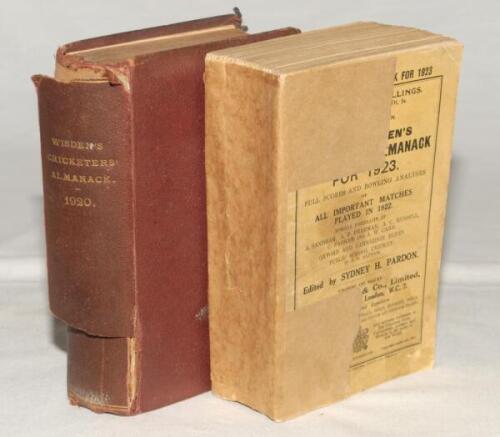 Wisden Cricketers’ Almanack 1920 & 1923. 57th & 60th editions. The 1920 edition bound in maroon board, lacking original wrappers, with titles in gilt to spine. Boards worn and spine paper becoming detached, lacking photographic plate, page edges a little 