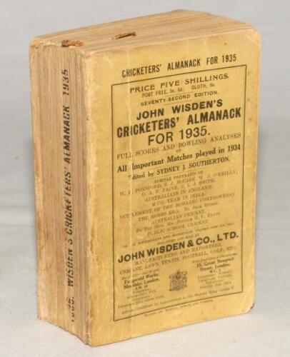 Wisden Cricketers’ Almanack 1935. 72nd edition. Original paper wrappers. Some breaking to page block, some wear, staining, age toning to wrappers, vertical crease to front and rear wrappers, some wear with slight loss to spine paper, good internally