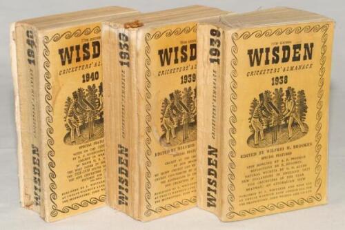 Wisden Cricketers’ Almanack 1938, 1939 and 1940. 75th to 77th editions. Original cloth covers. Bowing to the spines of the 1938 and 1940 editions, some staining and wear to the covers of all three editions, breaking to the page blocks of the 1939 and 194