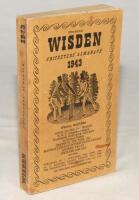 Wisden Cricketers’ Almanack 1943. 80th edition. Original limp cloth covers. Only 5600 paper copies printed in this war year. Some marks and staining to covers, particularly to the rear cover, small annotation to first advertising page otherwise in good/ve