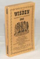 Wisden Cricketers’ Almanack 1943. 80th edition. Original limp cloth covers. Only 5600 paper copies printed in this war year. Very minor wear to covers and spine otherwise in good+ condition. Rare war-time edition