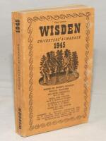 Wisden Cricketers’ Almanack 1945. 82nd edition. Original limp cloth covers. Only 6500 paper copies printed in this war year. Minor marks to front cover, very slight foxing to spine paper otherwise in good+ condition. Rare war-time edition