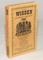 Wisden Cricketers’ Almanack 1945. 82nd edition. Original limp cloth covers. Only 6500 paper copies printed in this war year. Minor mark to front cover, slight loss to base of spine paper otherwise in good+ condition. Rare war-time edition