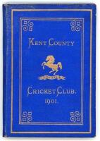 Kent County Cricket Club Annual 1901. Hardback ‘blue book’. Original decorative boards. Gilt titles and to all page edges with gilt Kent emblem to centre. Printed by Cross & Jackman, ‘The Canterbury Press’ 1895. Slight age toning/darkening to spine, very 