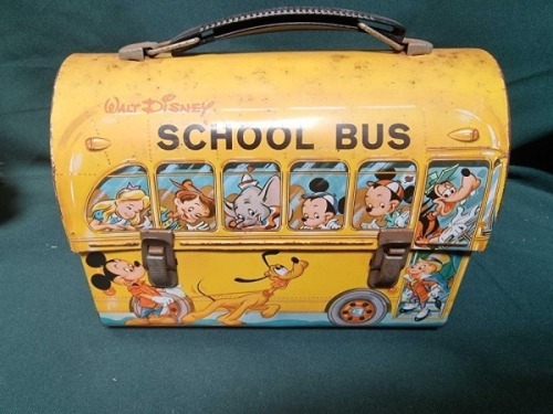 Disney School Bus Dome Lunch Box This Domed, Tin Lunch Box Was Made By Aladdin Industries In 1961. It Has Two Metal Snaps For A Hinged Lid And A Collapsible, Yellow Plastic Handle. The Box Is In The Shape Of A School Bus , And Colourful Portraits Of Disne