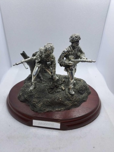 Dropzone pewter silver plated with a bronze base with a mahogany plinth no box 1 of 3000
