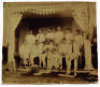 Lord Hawke’s tour of the United States and Canada 1891. Good, large, original and attractive photograph of the touring team, seated and standing in front of a pavilion on the tour. The photograph, with illegible name of photographer to corner, shows Hawke