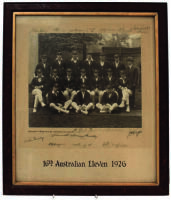 Australia tour of England 1926. Impressive official sepia photograph of the Australian team who toured England in 1926, seated and standing in rows, wearing cricket attire and all dressed in their touring caps and blazers. The photograph, by T. Bolland of