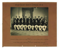 Indian tour of Australia 1947/1948. Large official mono photograph of the Indian team who toured Australia in 1947/48, seated and standing in rows and wearing cricket attire and tour blazers with printed title to top border ‘Indian Cricket Team in Austral