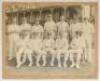 Warwickshire C.C.C. c.1913/14. Excellent and large early original mono photograph of the Warwickshire team seated and standing wearing cricket attire, some with Warwickshire caps, in front of a pavilion. Players featured are Quaife, F. Foster, Kinneir, G.