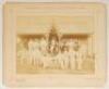 ‘Tranmere Cricket Club, Season 1888’. Large, early original sepia photograph of the players and officials seated and standing at the front of the pavilion, wearing cricket attire. Title printed to top mount border. The photograph, by Robinson & Thompson o