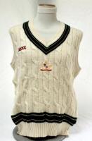 Steve Waugh. New South Wales & Australia 1984-2004. Australian white sleeveless sweater worn by Waugh on the Australian tour of England in 1993. The sweater, by Silver Fleece, with embroidered Australian emblem to the centre of the chest and ‘XXXX’ sponso