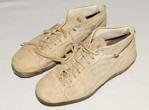 Max Walker. Australia. A pair of Puma cricket boots with leather uppers and soles, match worn by Walker. Both boots signed and presented to David Frith by Walker, one appears to be dated &lsquo;75&rsquo;. Good condition