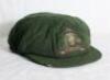 Clarence Victor ‘Clarrie’ Grimmett. Wellington, Victoria, South Australia & Australia 1911-1941. Australian green wool Test cap with Australian emblem to front with kangaroo and emu embroidered in metal thread and coloured thread with the legend ‘Advance 