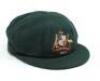 Gilbert Roache Andrews Langley. South Australia & Australia 1945-1957. Australian green wool Test cap worn by Gil Langley during the Australian Test tour of England in 1953. The cap, by Farmers of Sydney, embroidered with the Australia emblem and below ‘1