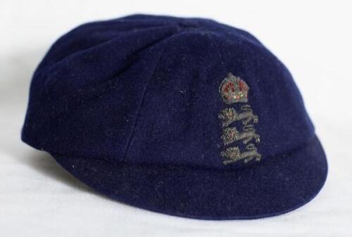 Thomas Richardson. Surrey, London County, Somerset & England 1892-1904. Original England cloth Test cap presented to Richardson for his Test match appearances playing for England in between 1893 and 1898. The dark blue cap, with much smaller peak than lat