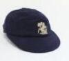 Kumar Shri Duleepsinhji. Sussex & England 1924-1932. M.C.C./England navy blue cloth Test touring cap, by E.C. Devereux of Eton, with excellent embroidered touring emblem of St. George & Dragon. His name ‘K.S. Duleepsinhji’ inscribed in black ink to the in