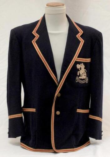 Thomas Godfrey Evans. Kent & England 1939-1967. M.C.C. navy blue touring blazer worn by Evans on the M.C.C. tour of Australia in 1954/55. The blazer, by Simpson, Daks, embroidered with the M.C.C. emblem in white of St George & Dragon of England and below 