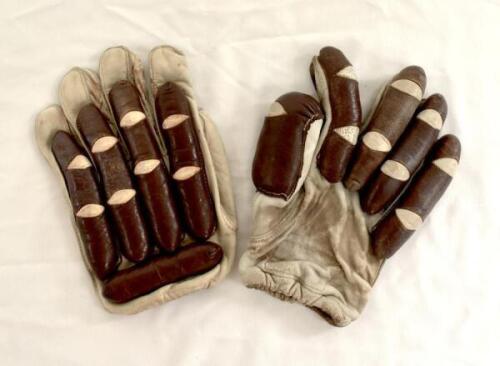 Donald George Bradman. New South Wales, South Australia & Australia 1927-1949. A pair of batting gloves presented to David Frith by Don Bradman at the Lord’s Taverners reception and Dinner held at the London Hilton on the 13th May 1974. The white leather 