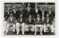 Middlesex 1937. Mono plain back real photograph postcard of the Middlesex team seated and standing in rows wearing cricket attire and blazers. The postcard with official stamp to verso for A. Wilkes & Son, West Bromwich, with typed caption listing the pla