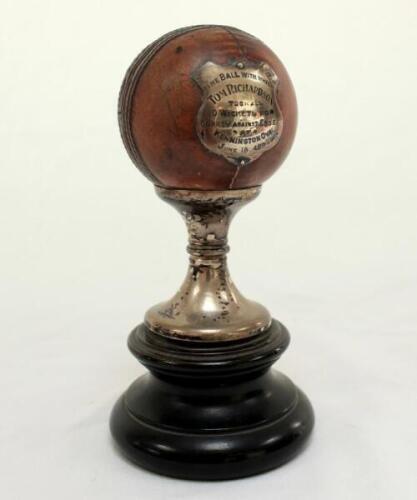 Thomas Richardson. Surrey, London County, Somerset & England 1892-1904. Original cricket ball with which Tom Richardson took all ten wickets for Surrey against Essex at The Oval in June 1894. The ball mounted on a silver metal stand with wooden base has a