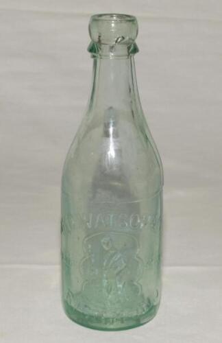 Cricket bottle. Attractive early cricket ginger beer bottle with ‘N.B.D. Watson & Co, Richmond‚‘ with figure of a batsman and ball to the side of the bottle. Approx 8” tall. Odd minor faults otherwise in good condition